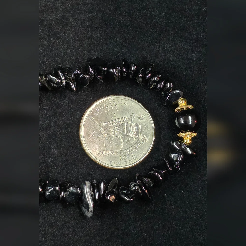 Black Beaded Device Wrist Strap with Gold Accents